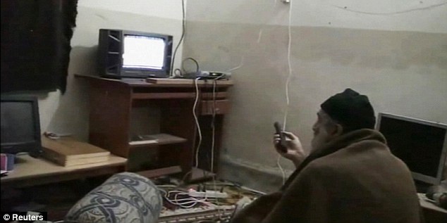 Osama Bin laden watching TV